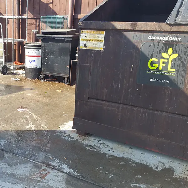 Dumpster pad cleaning Brunswick County, NC by F-Bomb Power Washing