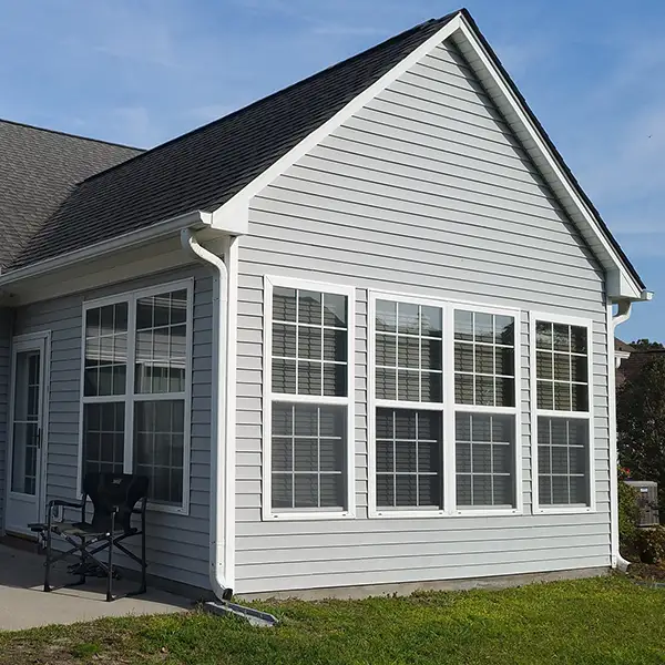 Sparkling home in Sunset Beach, NC soft washed siding and patio.